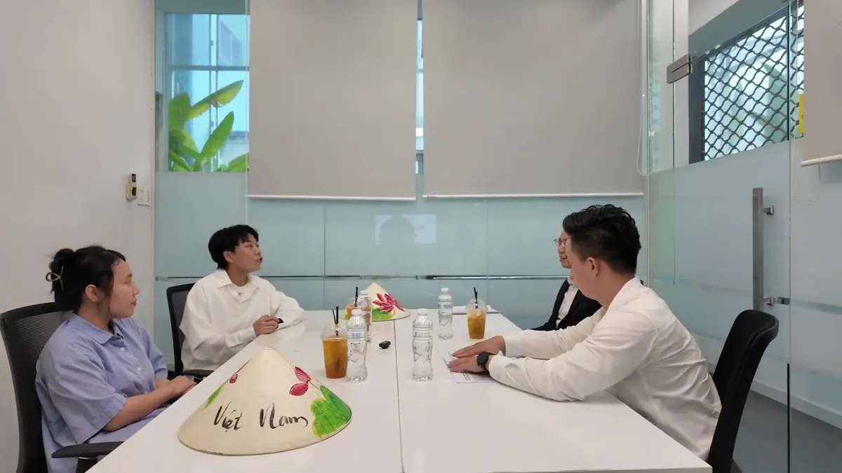 A working session between 8020 and Aquinas International Academy